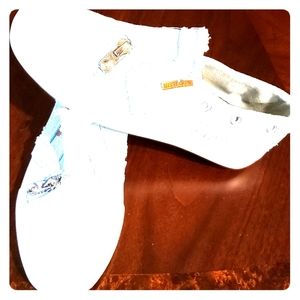 Womens canvas slip on shoe.